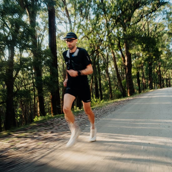 Runner smiling wearing a pair of smith sunglasses Runner smiling wearing a pair of smith sunglasses
