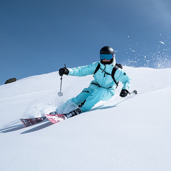Skier wearing Smith helmet and goggles Skier wearing Smith helmet and goggles