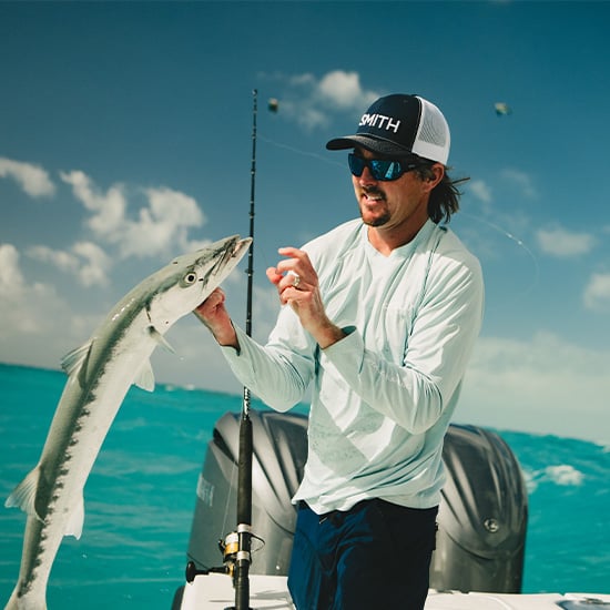 Man fishing wearing smith sunglasses Man fishing wearing smith sunglasses